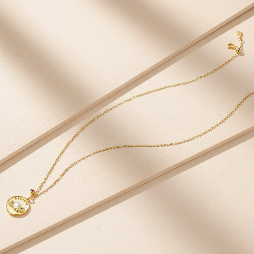 Gold-tone sterling silver elephant medallion necklace