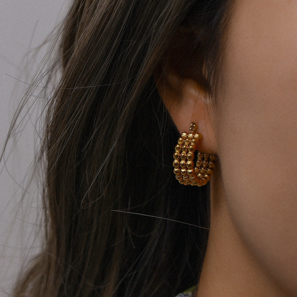 Gold-tone woven hoop earrings