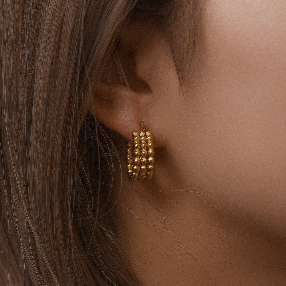 Gold-tone woven hoop earrings