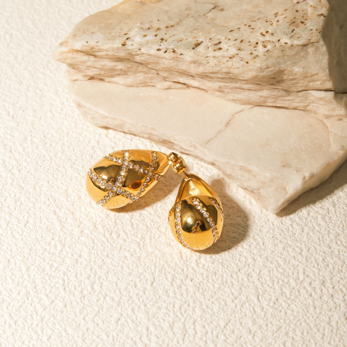 Gold-tone sculptural drop earrings