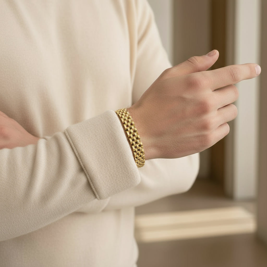 Gold bracelet on a white background