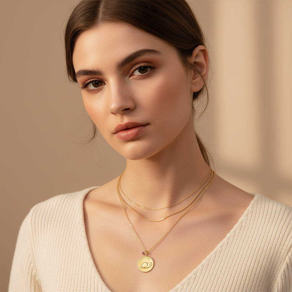 Gold-tone sterling silver elephant medallion necklace